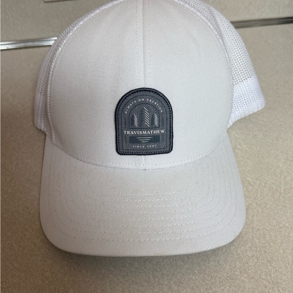Travis Mathew White Hat with Minimalist Design